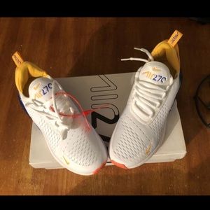 Yellow blue white running shoes